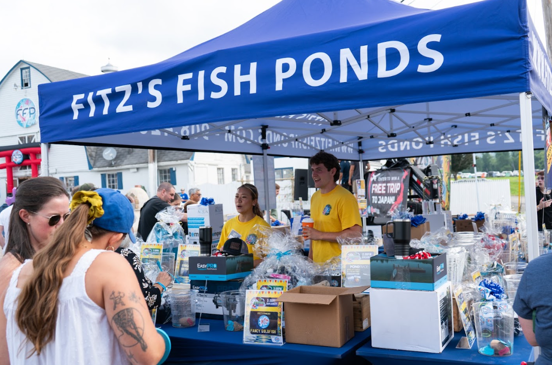 Giveaways included koi, fish food, pond products, filtration equipment, aquatic plants, and other products for koi and pond enthusiasts.