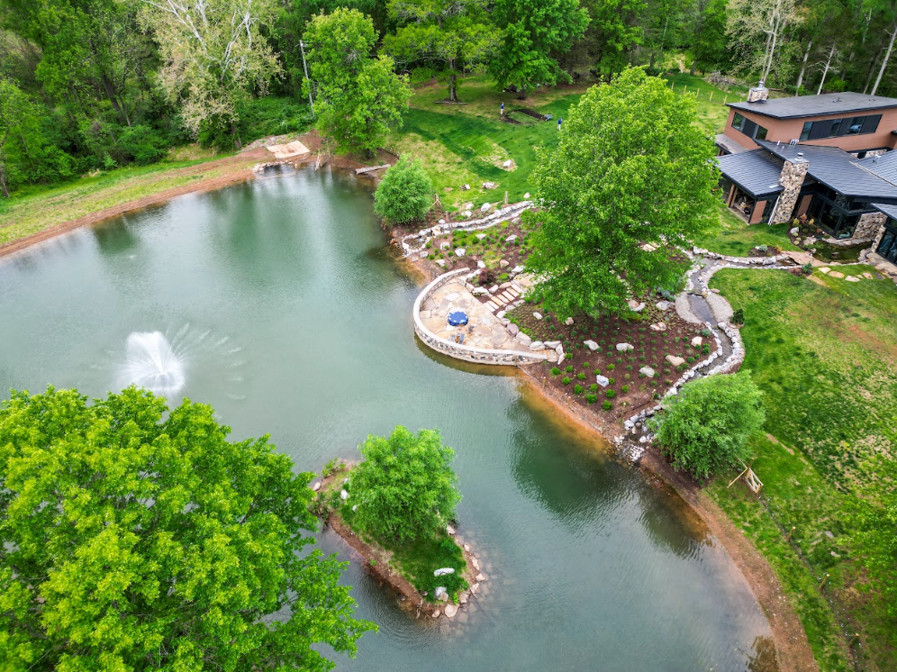 The rear pond was intentionally bumped outward on both sides, with each expanded area reaching approximately 15 feet wide and 3 feet deep.