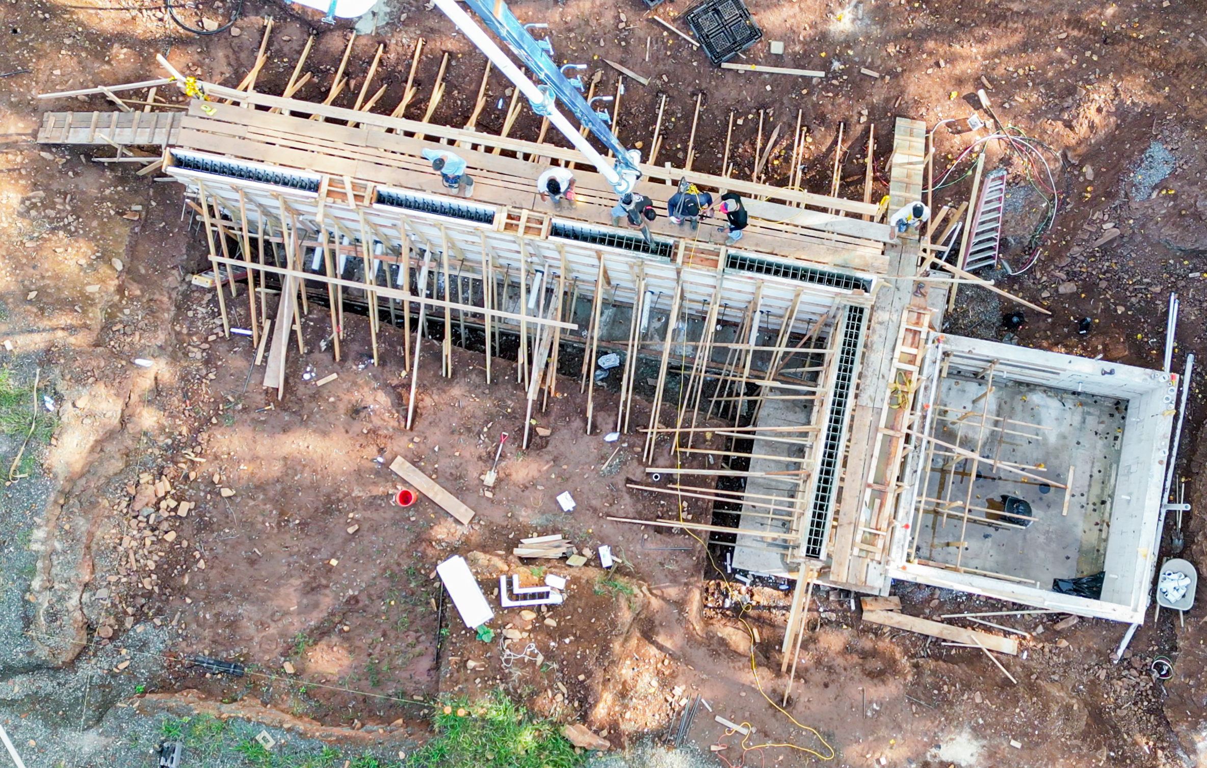 Fitz's Fish Ponds utilized BuildBlock insulated concrete forms (ICFs) to construct the pond's substantial structural walls. Commonly used in residential and commercial construction, ICFs combine reinforced concrete with continuous insulation, providing both structural durability and thermal performance. Fitz's Fish Ponds utilized BuildBlock insulated concrete forms (ICFs) to construct the pond's substantial structural walls. Commonly used in residential and commercial construction, ICFs combine reinforced concrete with continuous insulation, providing both structural durability and thermal performance.