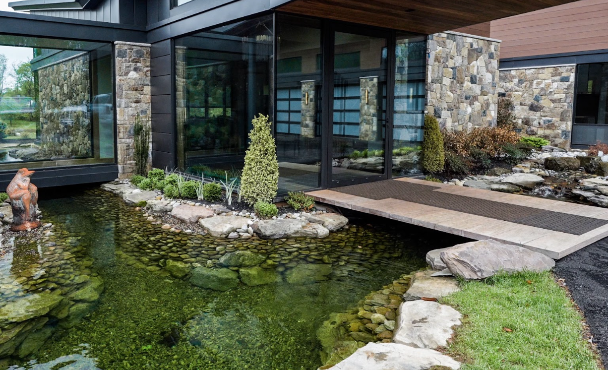 The system incorporates four deep-water aeration diffusers positioned throughout the pond. Weighted airlines connect the diffusers to the aeration equipment while keeping the installation discreet.
