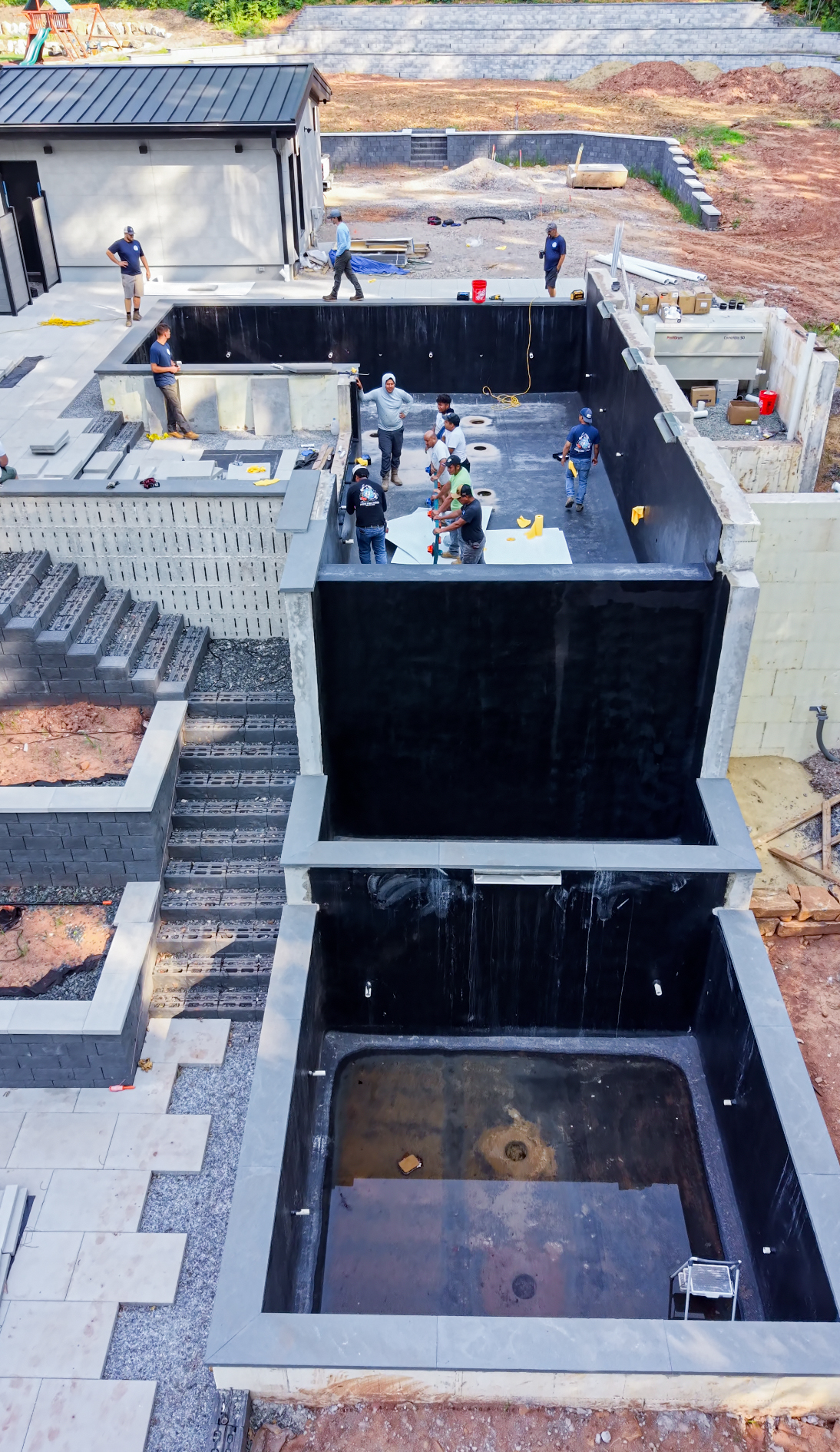 Multiple wall intersections, structural transitions, and integrated plumbing penetrations required careful coordination throughout the installation. Multiple wall intersections, structural transitions, and integrated plumbing penetrations required careful coordination throughout the installation.